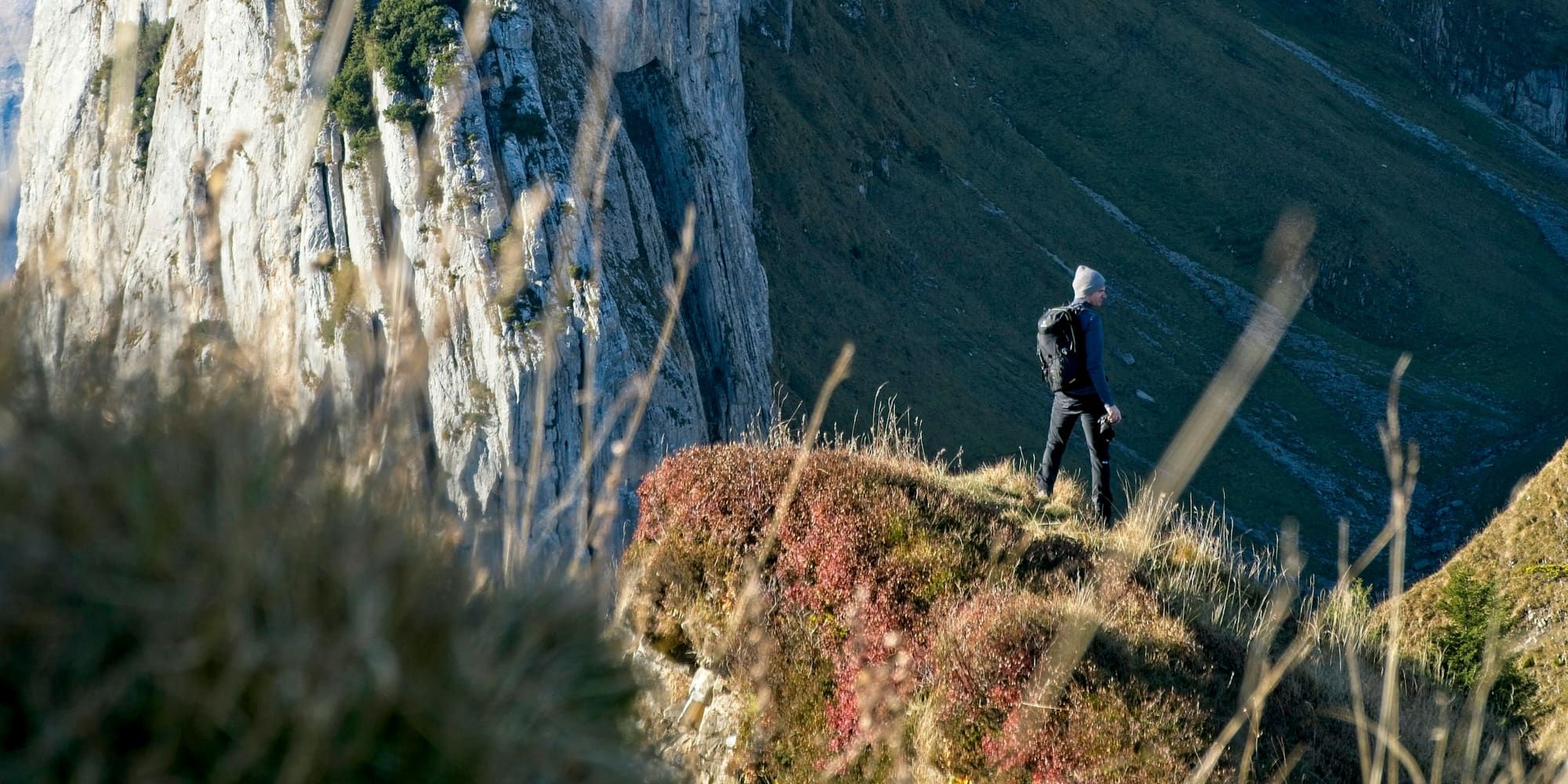 Hiker walking along a high mountain ridge